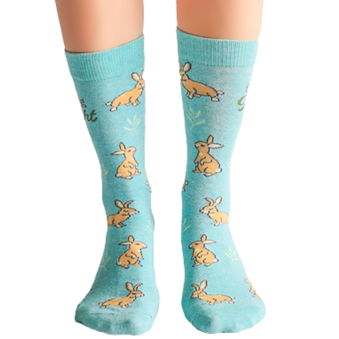 This bunny is one of a kind. ──────────────── Size Women's shoe size 6-9 Men’s shoe size 4-7 EUR 37-41 ──────────────── Materials & Attributes 70% Combed Cotton, 28% Nylon and 2% Spandex. Reinforced stitching on toe to protect from wear. Print on Socks: "I'm a Fluffing Delight" ──────────────── Care Machine wash and hang to dry. Do not iron or bleach.