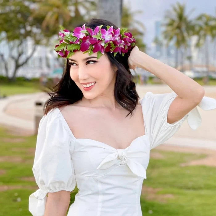 Orchid-only floral haku lei worn on the head